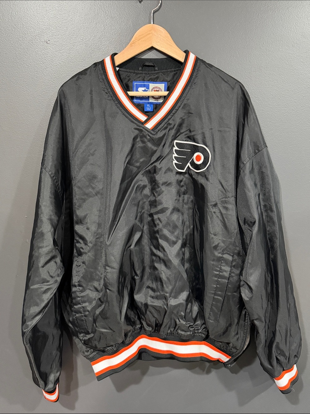 STARTER Philadelphia Flyers Black Pullover Windbreaker with Orange & White Trim